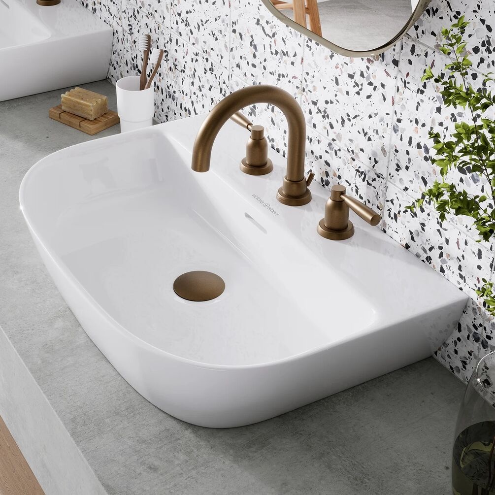 Lifestyle image of the Victoria + Albert Lussari 600mm Gloss White Back to Wall Countertop Basin with brushed bronze 3 hole basin taps